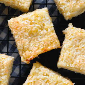 Coconut bars on a black board.