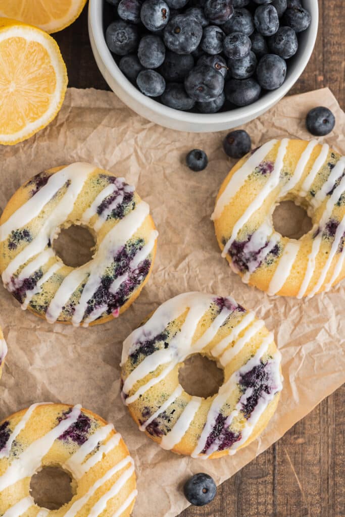 Donuts on a brown paper.
