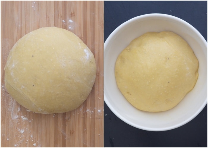 The dough ball on a wooden board and in a white bowl.