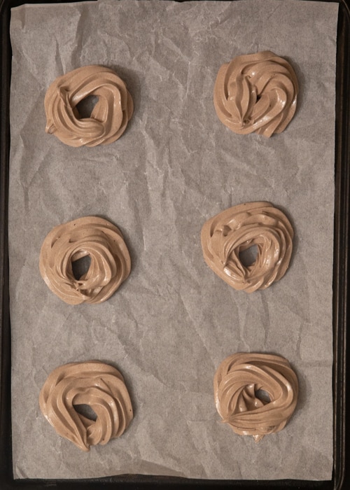 The rings on the prepared baking sheet before baking.