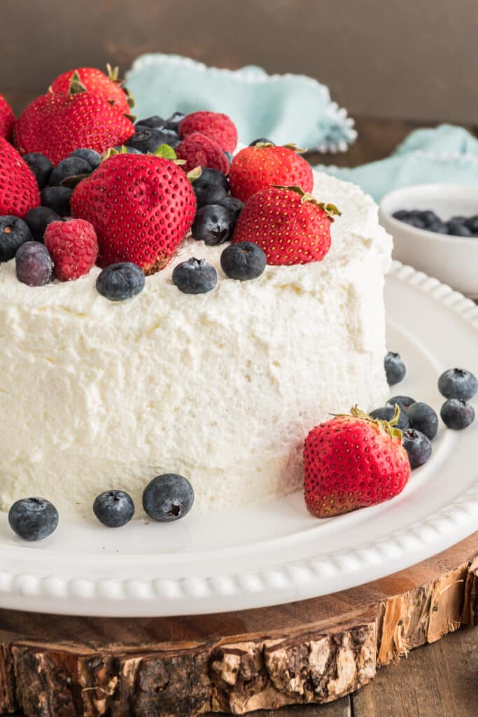 Cake on a white cake plate.