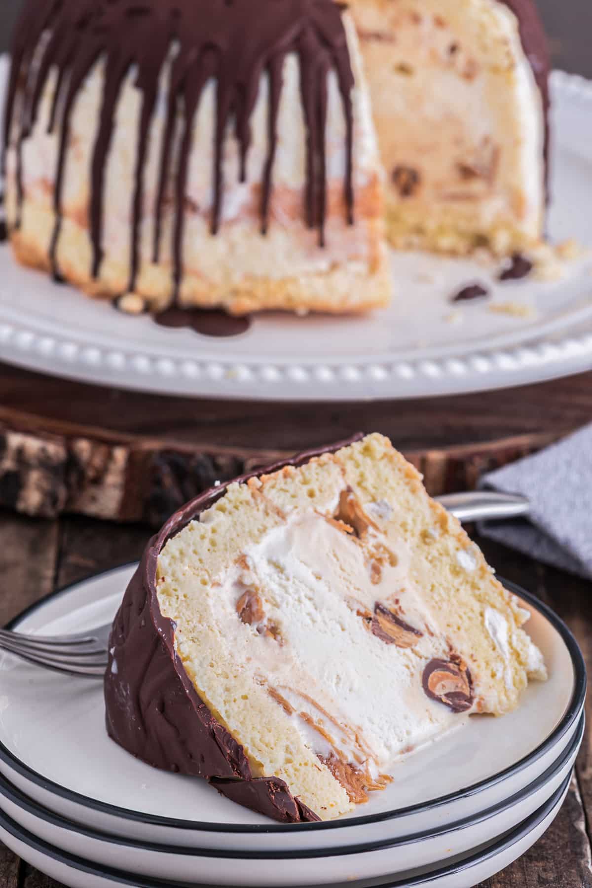 Zuccotto with a slice cut on a white plate.