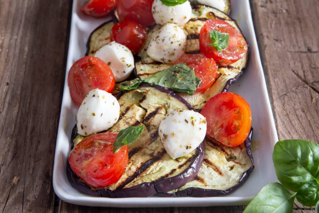 Caprese on a white plate.