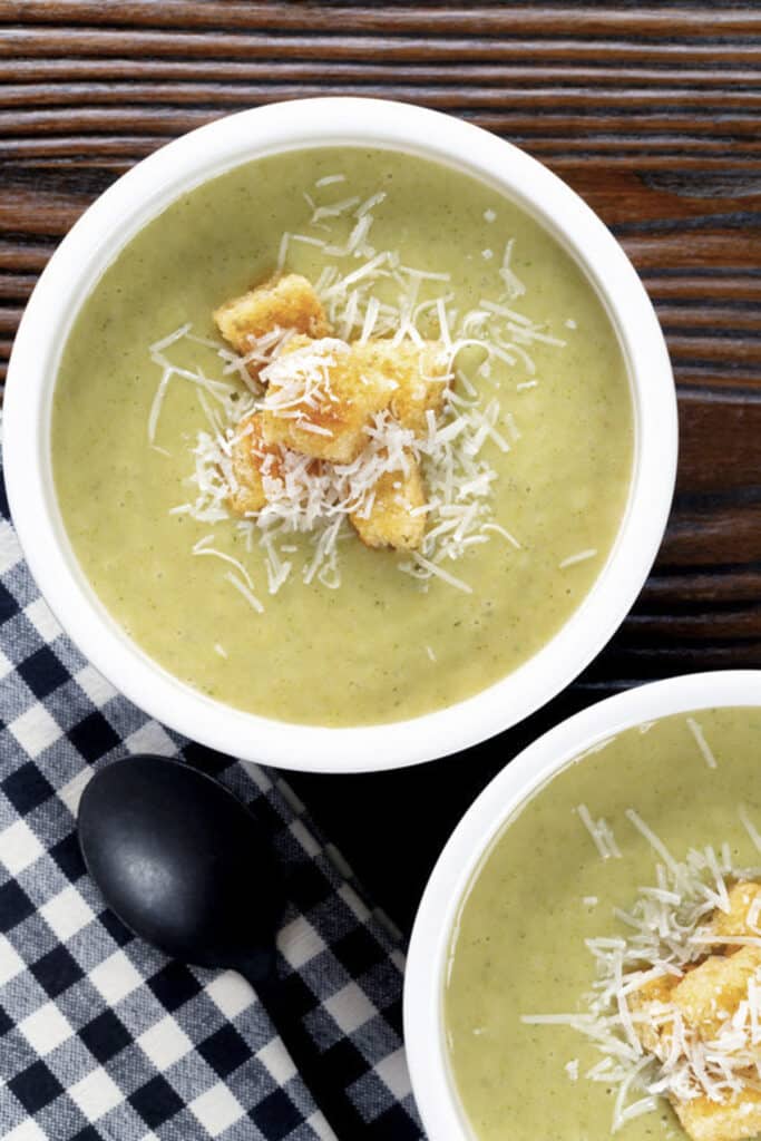 Broccoli soup in two bowls.