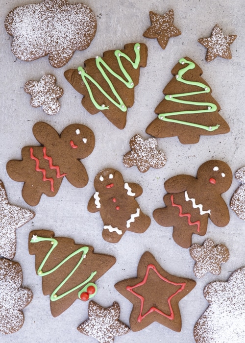 Gingerbread cookies on a white board.