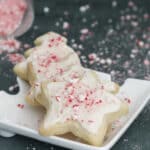 Frosted shortbreads on a white plate.