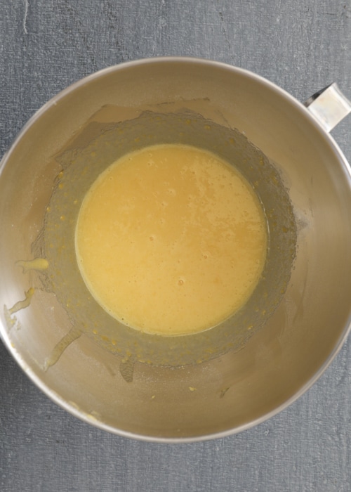 Eggs, oil and sugar beaten in the mixing bowl.