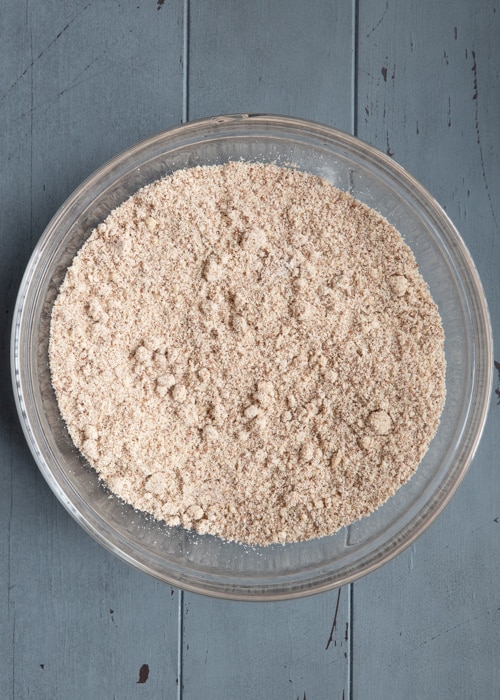 The dry ingredients whisked in a glass bowl.