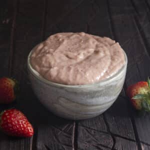 Strawberry pastry cream in a blue bowl.