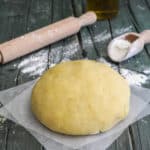 Olive oil pie crust on waxed paper.