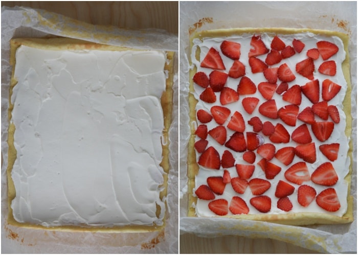 The filling spread on the cake and topped with sliced strawberries.