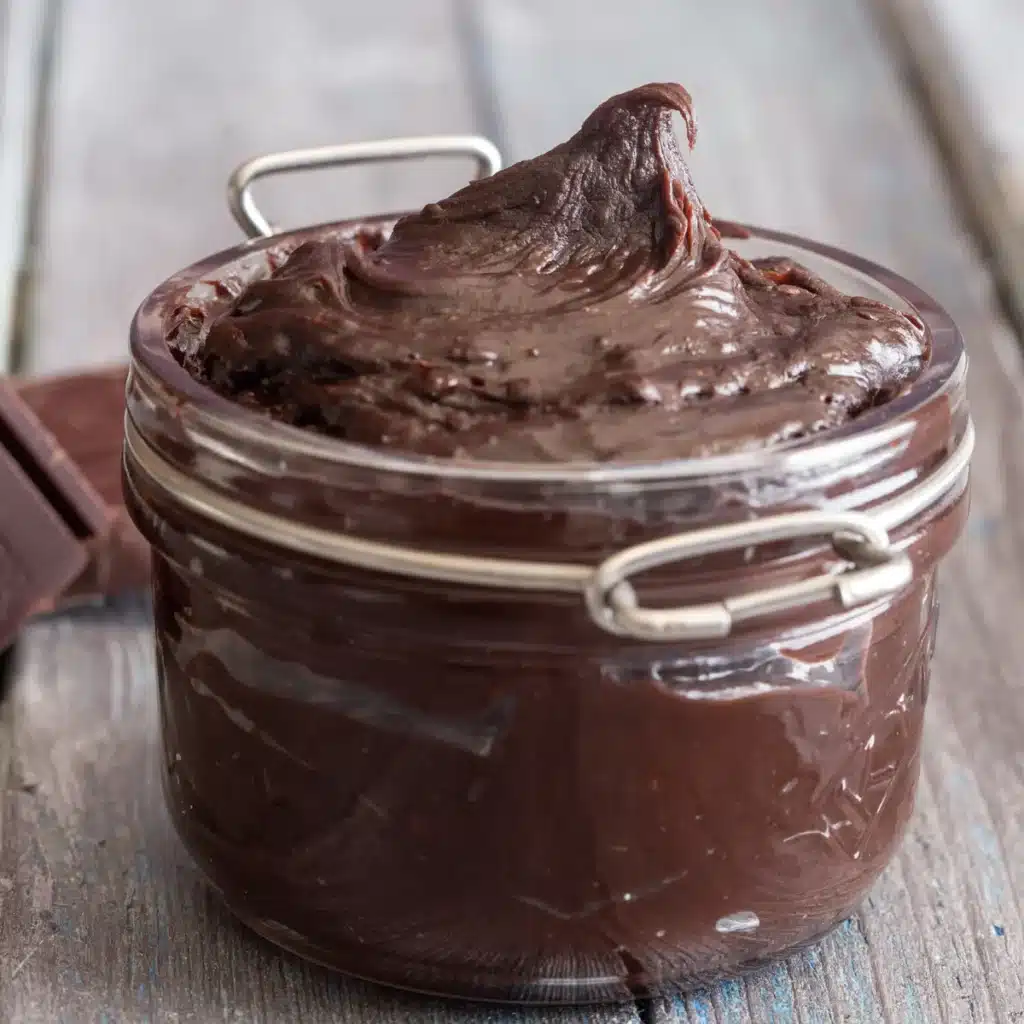 Chocolate spread in a glass jar.