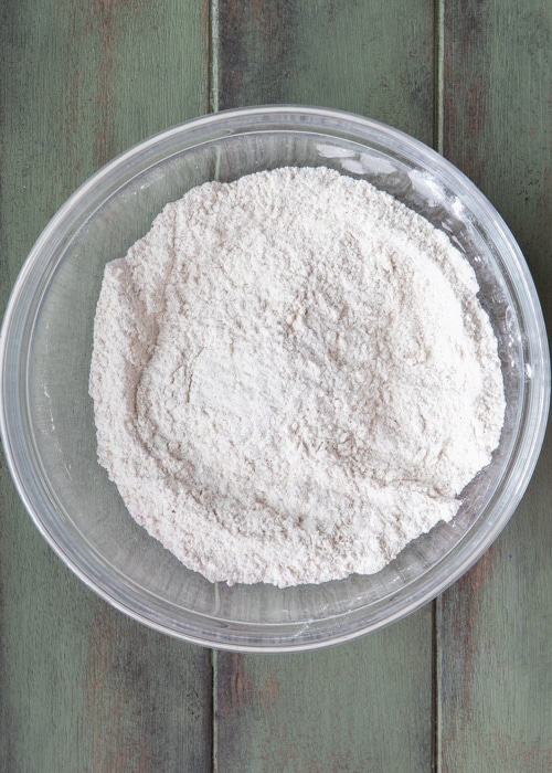 The whisked ingredients in a glass bowl.