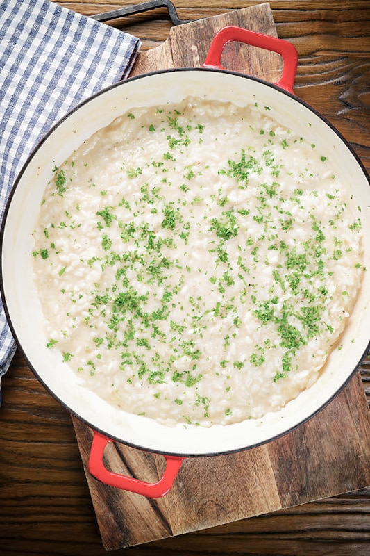 Cheese risotto in a pan.