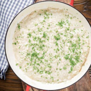 Cheese risotto in a pan.