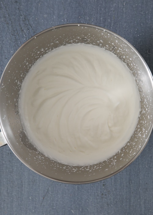 The whipping cream filling whipped in the mixing bowl.