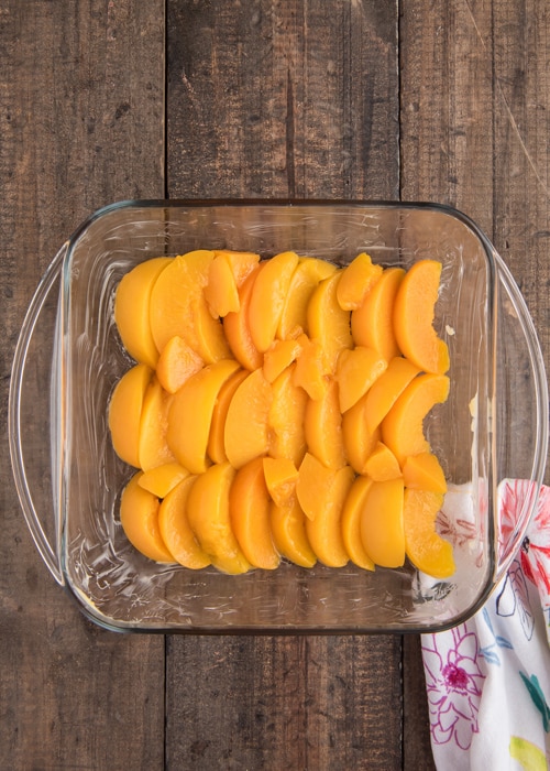 Peach slices in the pan.