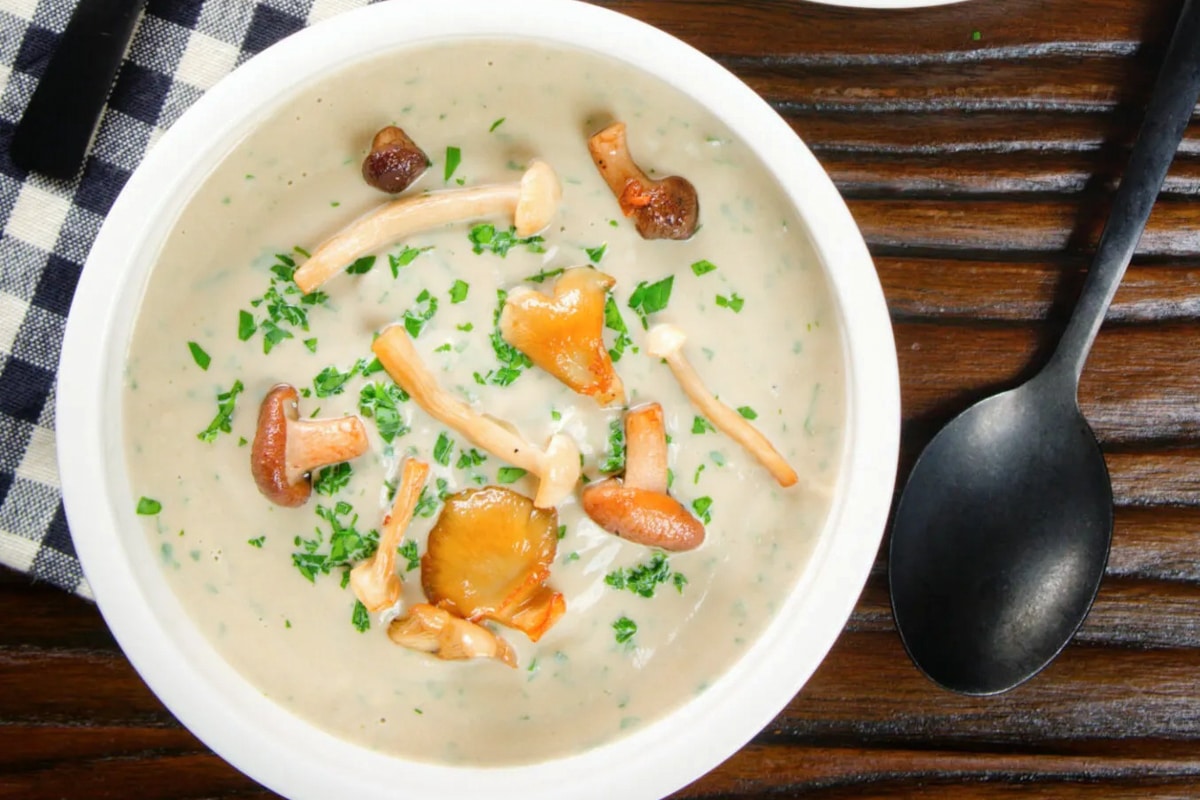 Mushroom soup in a white bowl.