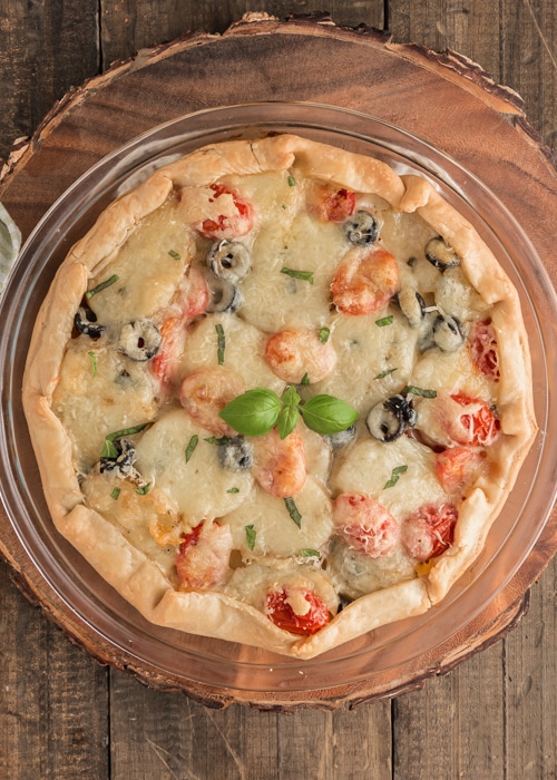 The pie baked on a wooden board.