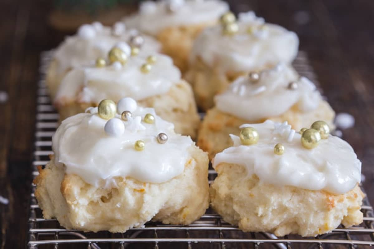 Ricotta cookies on a wire rack.