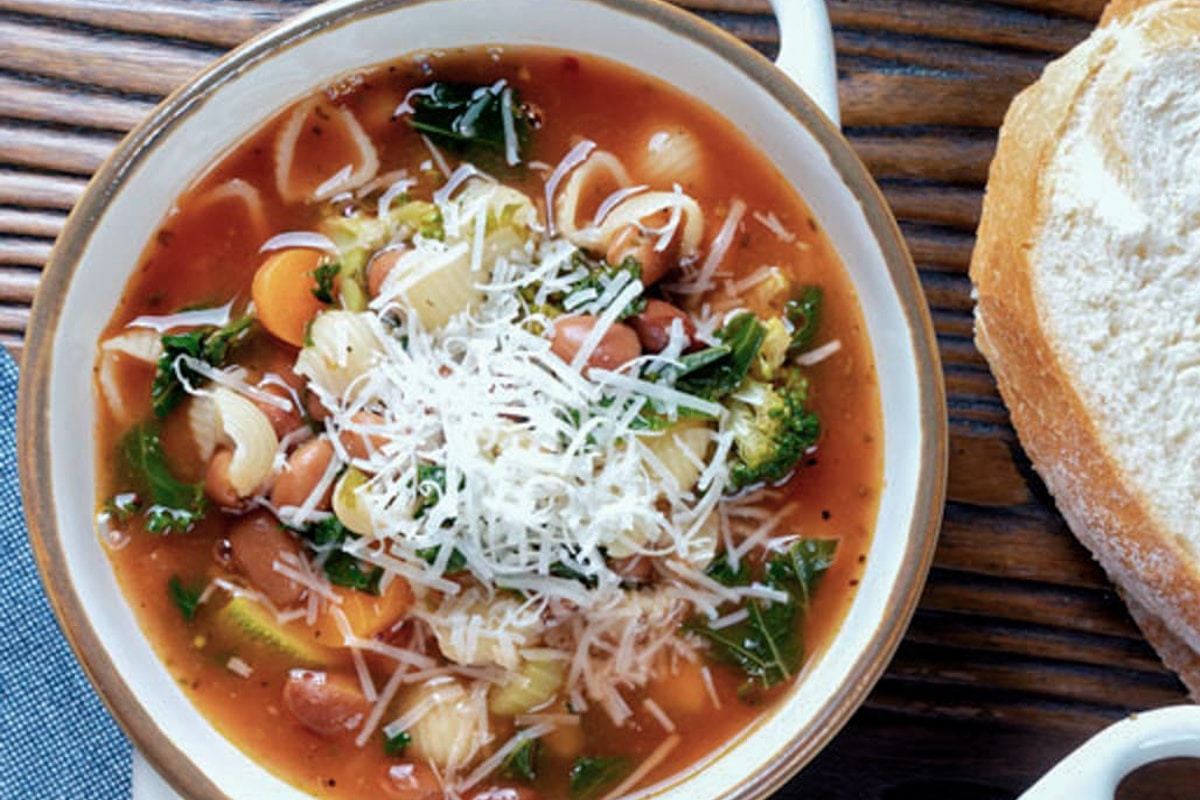 Vegetable soup in a white bowl.