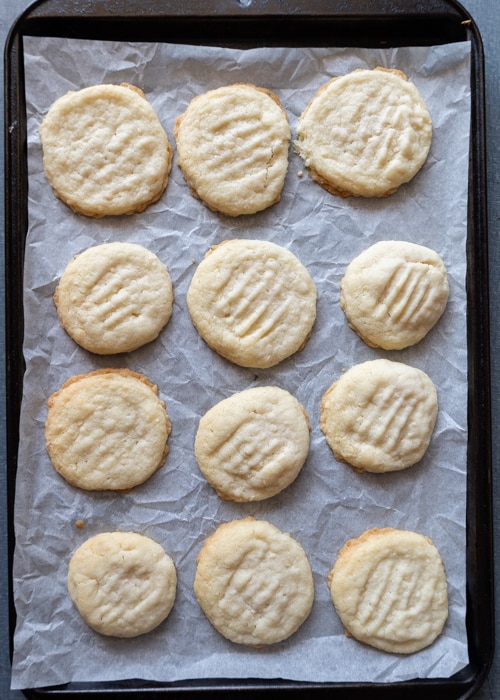 The cookies baked on the baking sheet.