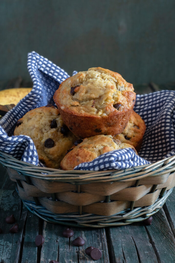 Muffins in a blue basket.