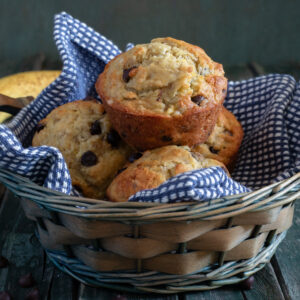 Muffins in a blue basket.