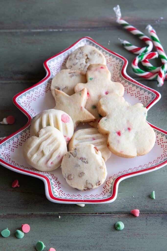 Cookies on a christmas tree plate.