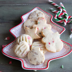 Cookies on a christmas tree plate.