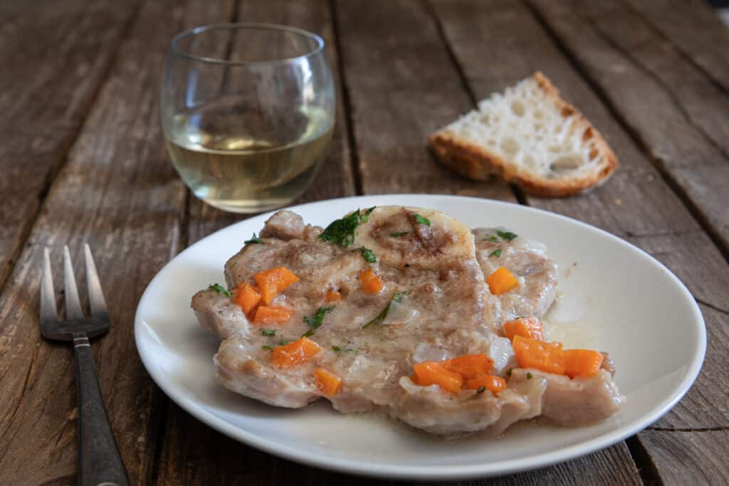 Ossobuco on a white plate.