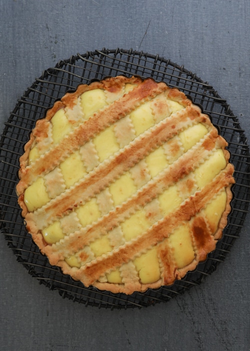 The baked crostata in the pie plate.