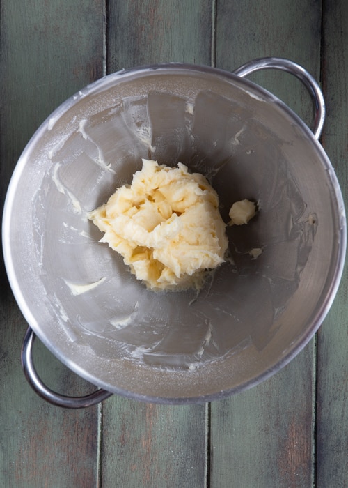 The butter and sugar beaten in the bowl.