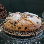 The Panettone Genovese on a black wire rack.