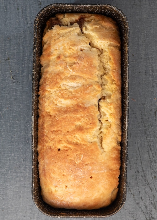 The baked bread in the loaf pan.