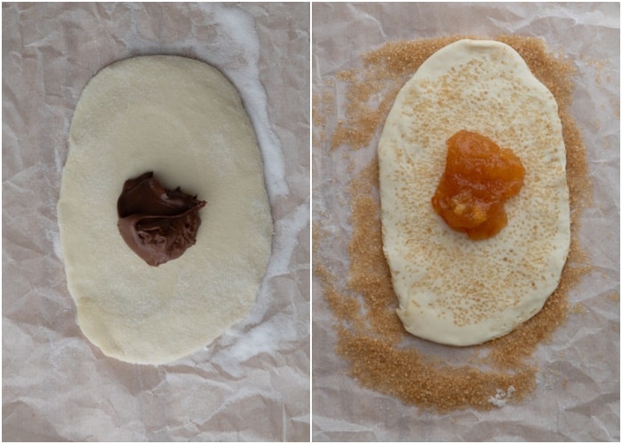 Rolling out the dough and topping with jam or spread.