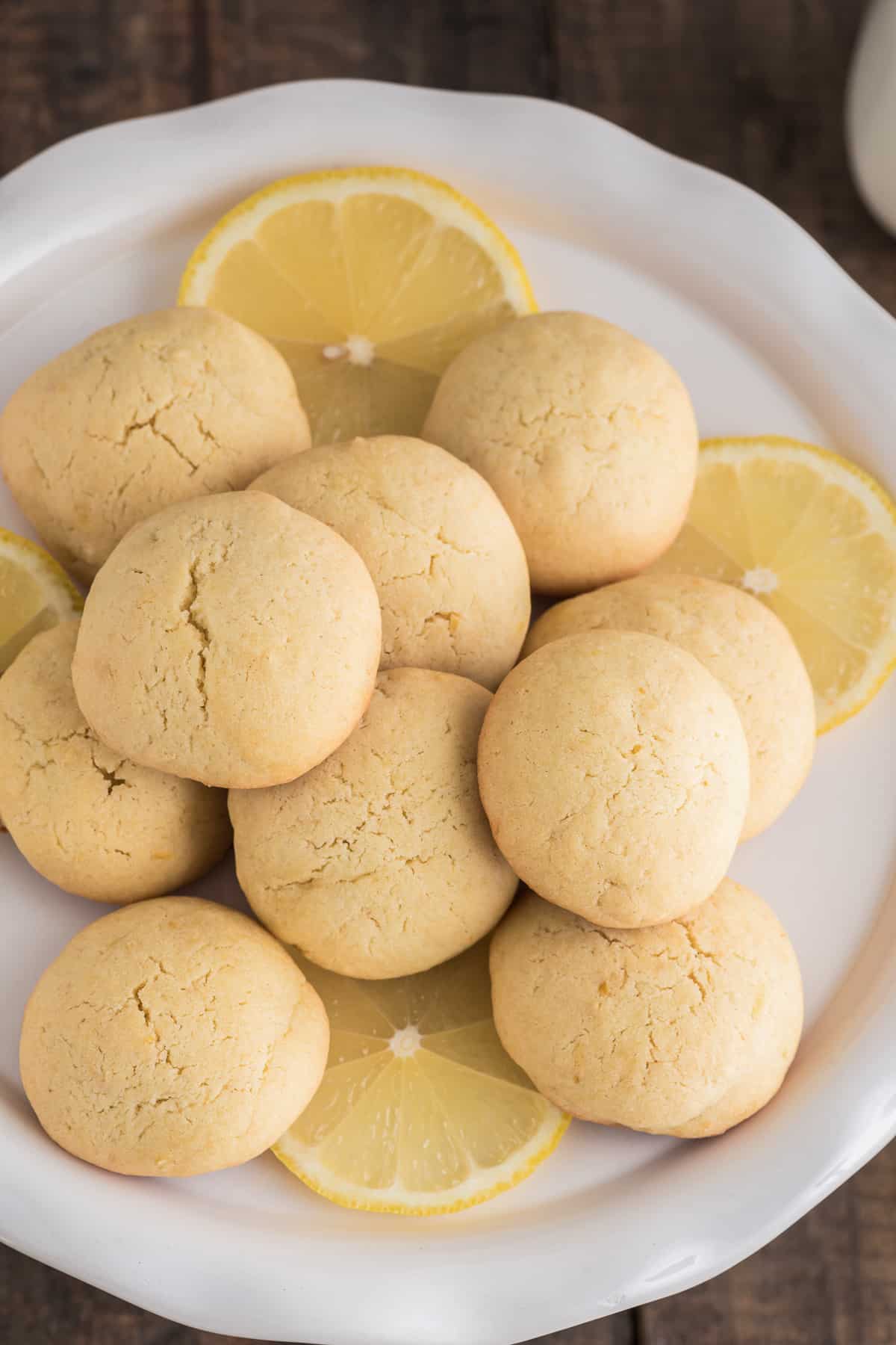 Lemon cookies on a white plate.