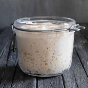 Lievito madre in a glass jar.
