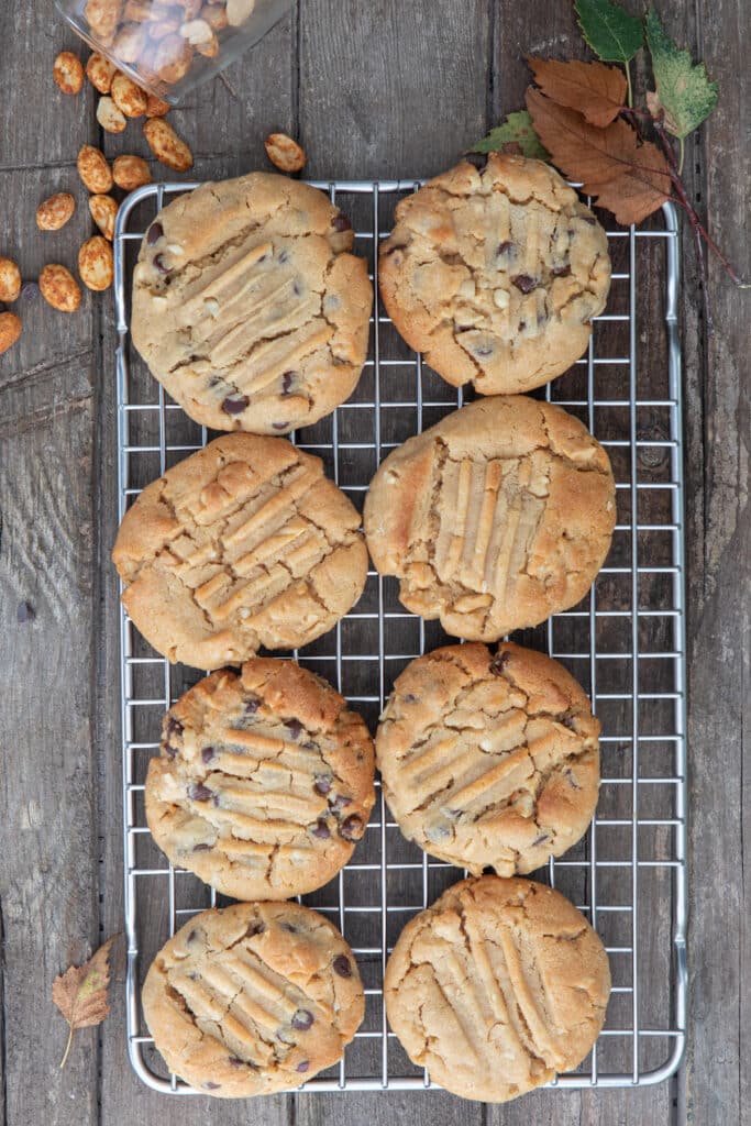 Peanut butter cookies on a wire rack.