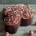 Chocolate colomba on a wooden board.
