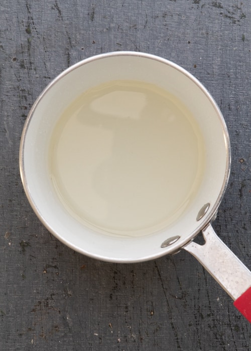 The vanilla syrup in a small pot.