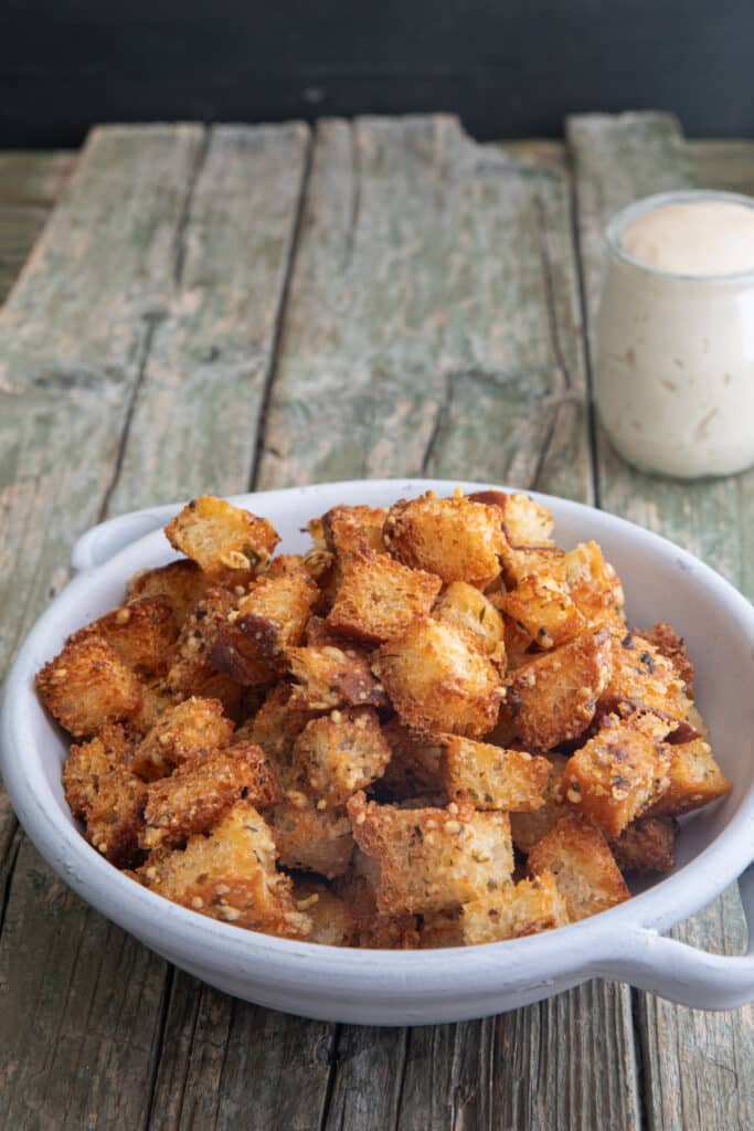 Croutons in a white bowl.