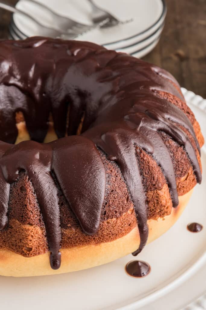 Tiramisu bundt cake on a white plate.