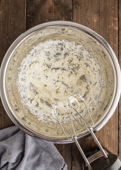 The whipped cream in a bowl.