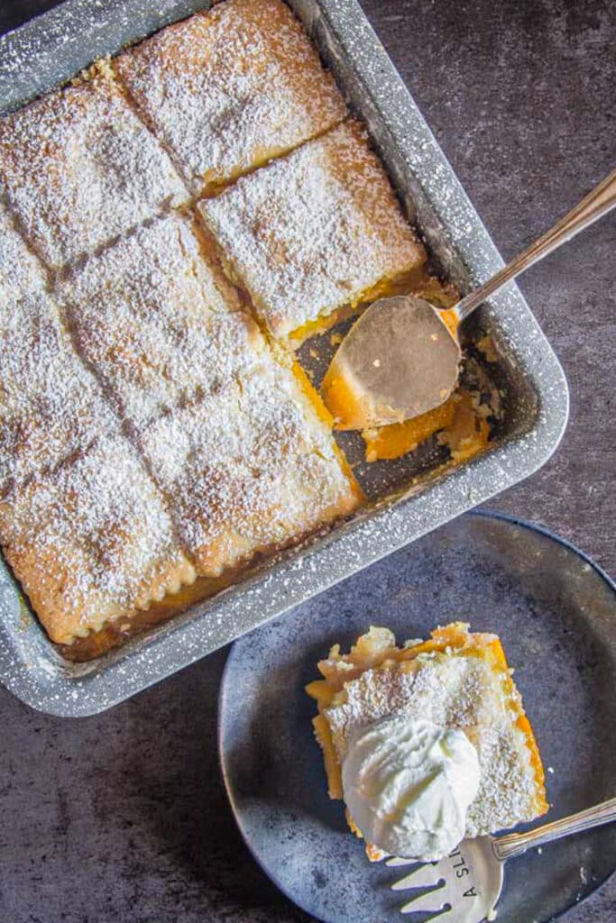 Crostata bars with one on a black plate.
