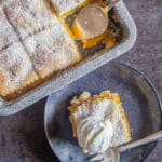 Crostata bars with one on a black plate.