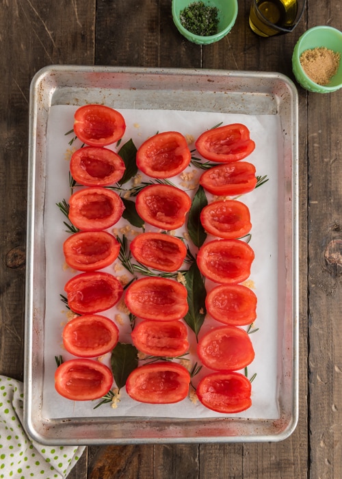 The sliced tomatoes on a pan.