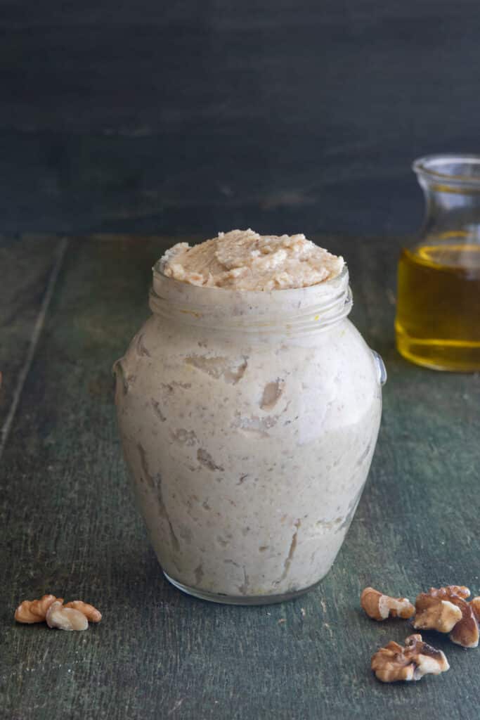 Nut pesto in a glass jar.