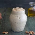 Nut pesto in a glass jar.