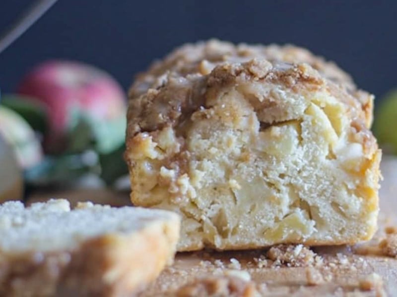 Apple bread with a slice cut.